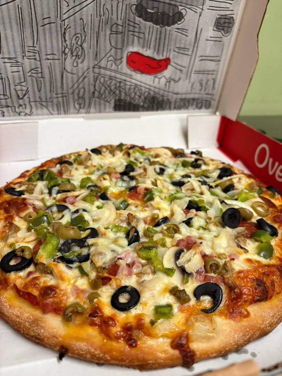 Specialty pizza from Rooted Love Company